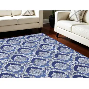 Photo of Blue and Ivory Damask Distressed Non Skid Area Rug