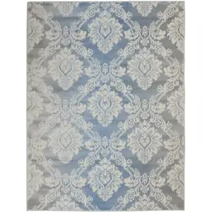 Photo of Blue and Ivory Damask Distressed Non Skid Area Rug