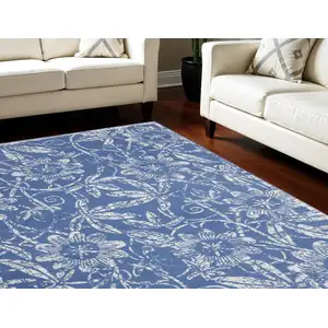 Photo of Blue and Ivory Floral Distressed Non Skid Area Rug