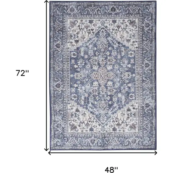 Blue and Ivory Floral Medallion Power Loom Distressed Area Rug Photo 3