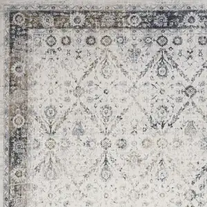 Photo of Blue and Ivory Floral Medallion Power Loom Distressed Washable Area Rug