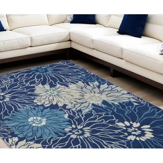 Blue and Ivory Floral Power Loom Area Rug Photo 1