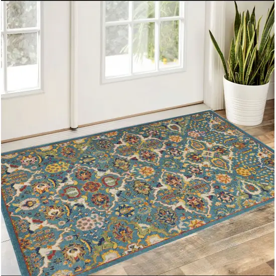 Blue and Ivory Floral Power Loom Area Rug Photo 1