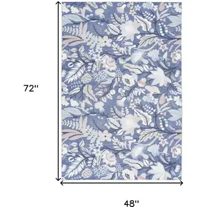 Photo of Blue and Ivory Floral Power Loom Washable Non Skid Area Rug