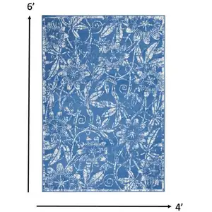 Photo of Blue and Ivory Floral Vines Area Rug