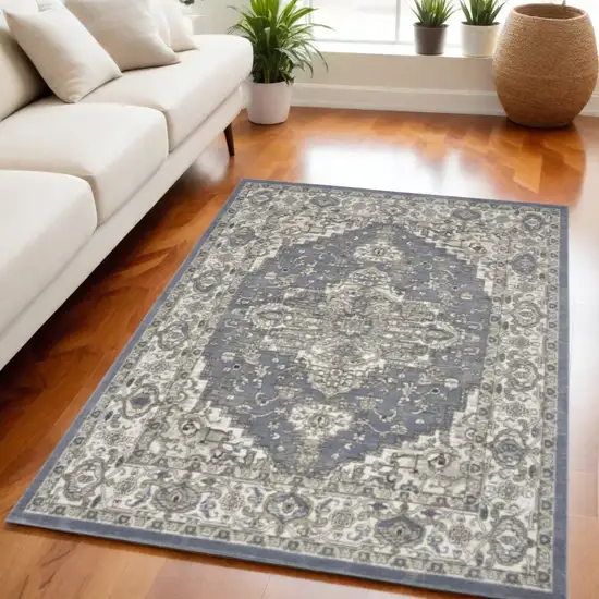 Blue and Ivory Medallion Power Loom Distressed Area Rug Photo 1