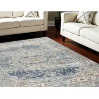 Photo of Blue and Ivory Medallion Power Loom Distressed Area Rug