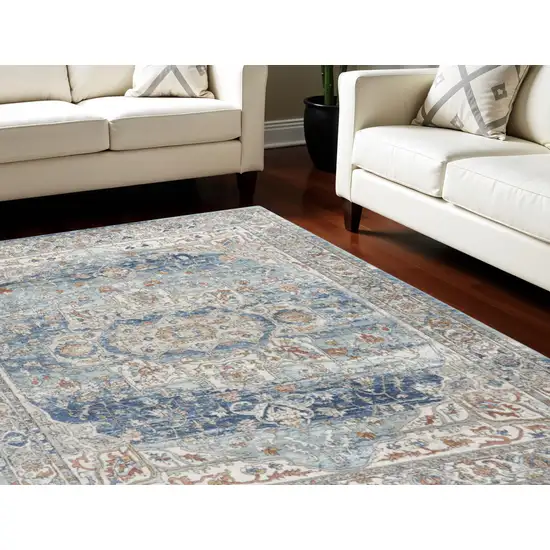 Blue and Ivory Medallion Power Loom Distressed Area Rug Photo 1