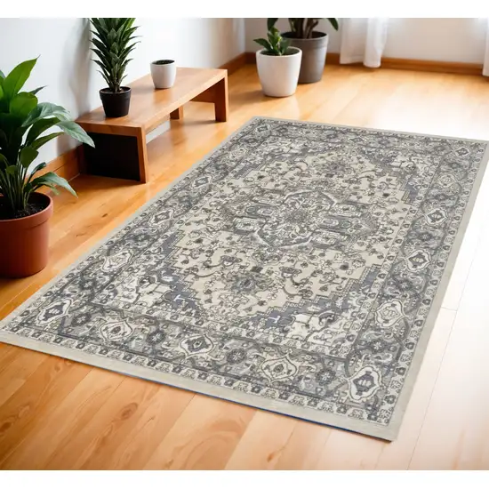 Blue and Ivory Medallion Power Loom Distressed Area Rug Photo 1