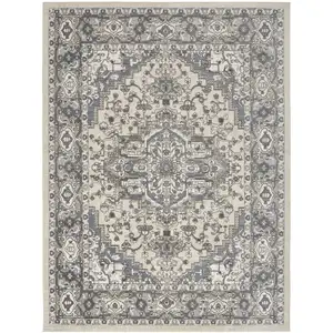 Photo of Blue and Ivory Medallion Power Loom Distressed Area Rug