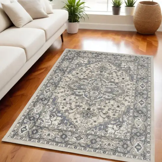 Blue and Ivory Medallion Power Loom Distressed Area Rug Photo 1