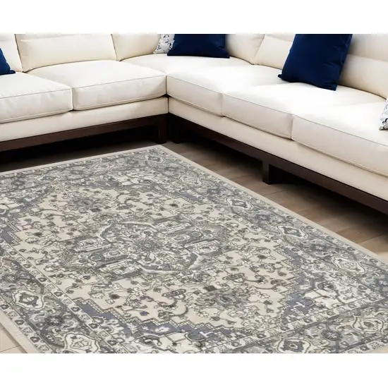 Blue and Ivory Medallion Power Loom Distressed Area Rug Photo 1