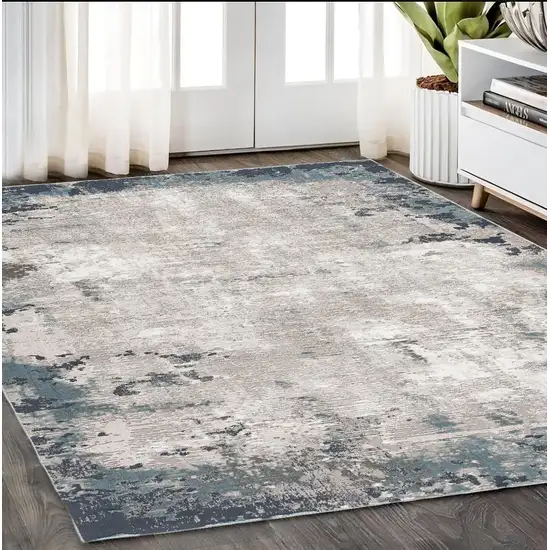 Blue and Ivory Abstract Power Loom Area Rug Photo 1