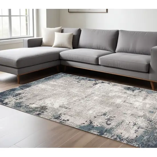 Blue and Ivory Abstract Power Loom Area Rug Photo 1