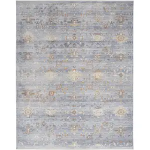 Photo of Blue and Ivory Oriental Power Loom Distressed Area Rug With Fringe