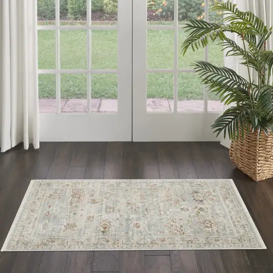 Blue and Ivory Oriental Power Loom Distressed Area Rug With Fringe Photo 8