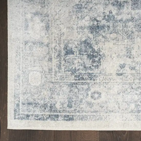 Blue and Ivory Oriental Power Loom Distressed Area Rug Photo 3