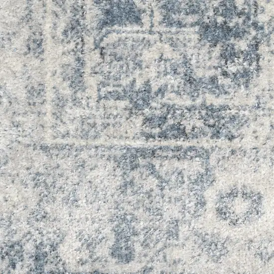 Blue and Ivory Oriental Power Loom Distressed Area Rug Photo 8