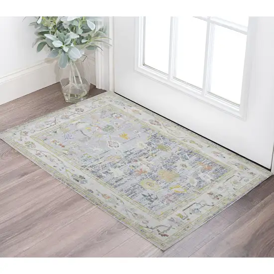 Ivory Blue and Orange Oriental Power Loom Worn Faded Area Rug Photo 1