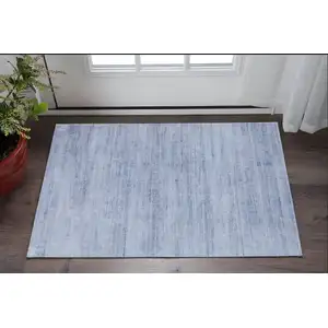 Photo of Blue and Ivory Power Loom Area Rug