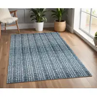 Photo of Blue and Ivory Power Loom Area Rug