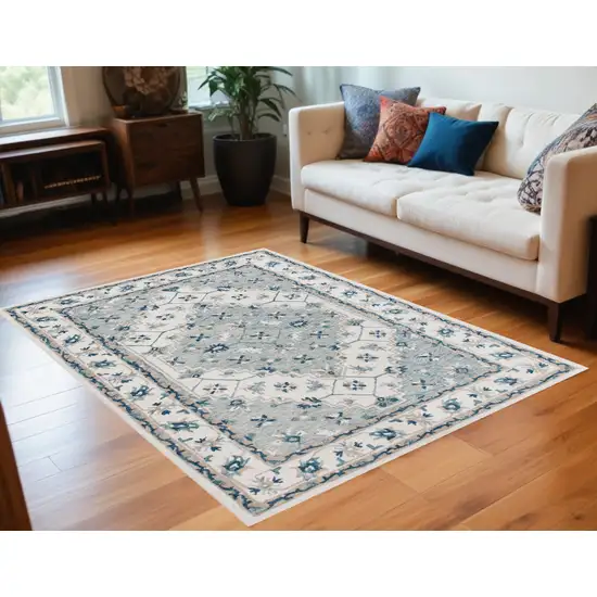 Blue and Ivory Wool Floral Hand Tufted Area Rug Photo 1