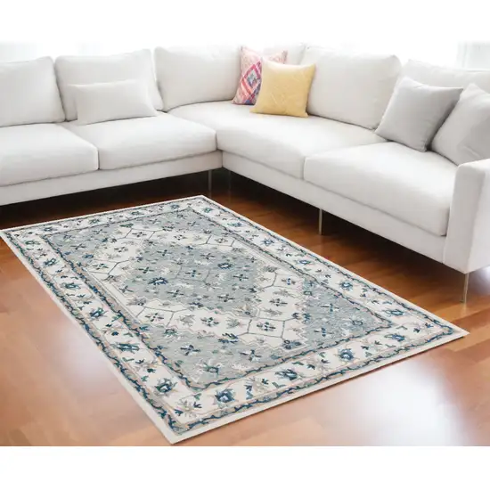 Blue and Ivory Wool Floral Hand Tufted Area Rug Photo 1