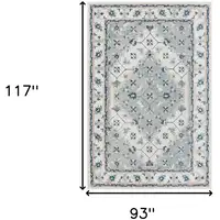 Photo of Blue and Ivory Wool Floral Hand Tufted Area Rug