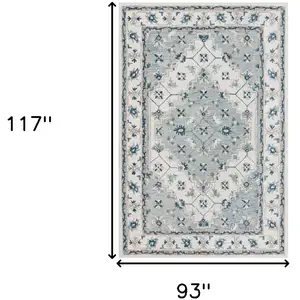 Photo of Blue and Ivory Wool Floral Hand Tufted Area Rug