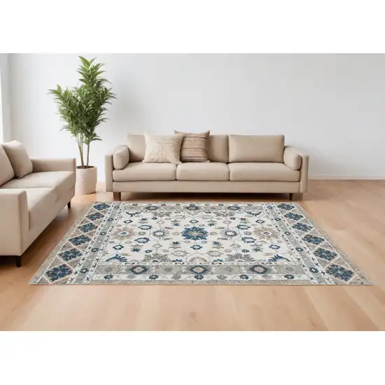 Blue and Ivory Wool Floral Hand Tufted Area Rug Photo 1