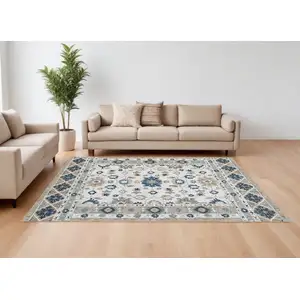 Photo of Blue and Ivory Wool Floral Hand Tufted Area Rug