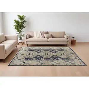 Photo of Blue and Ivory Wool Geometric Hand Knotted Area Rug With Fringe