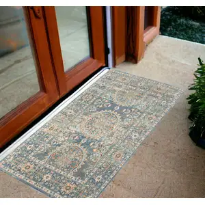 Photo of Blue and Orange Floral Medallion Stain Resistant Indoor Outdoor Area Rug