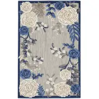 Photo of Blue and Orange Floral Power Loom Area Rug