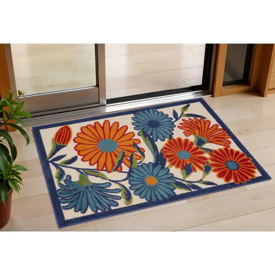 Blue and Orange Floral Power Loom Area Rug Photo 1