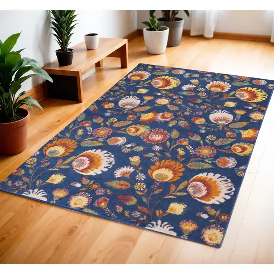 Blue and Orange Floral Power Loom Area Rug Photo 1