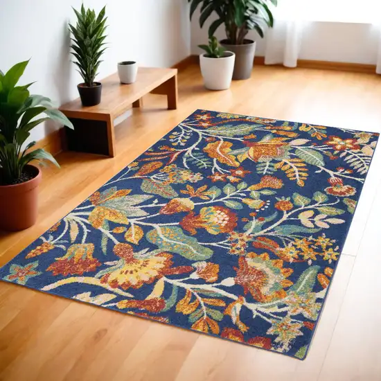 Blue and Orange Floral Power Loom Area Rug Photo 1