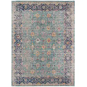 Photo of Blue and Orange Floral Power Loom Distressed Area Rug