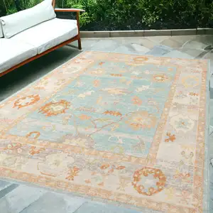 Photo of Blue and Orange Floral Stain Resistant Indoor Outdoor Area Rug