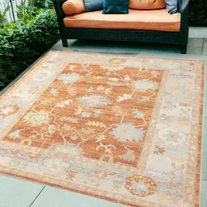 Photo of Blue and Orange Floral Stain Resistant Indoor Outdoor Area Rug