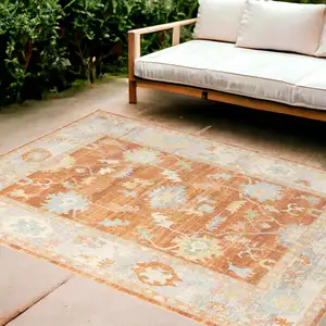 Photo of Blue and Orange Floral Stain Resistant Indoor Outdoor Area Rug