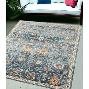 Photo of Blue and Orange Floral Stain Resistant Indoor Outdoor Area Rug