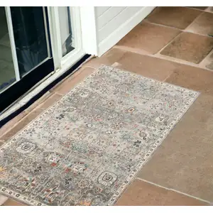 Photo of Blue and Orange Floral Stain Resistant Indoor Outdoor Area Rug