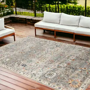 Photo of Blue and Orange Floral Stain Resistant Indoor Outdoor Area Rug