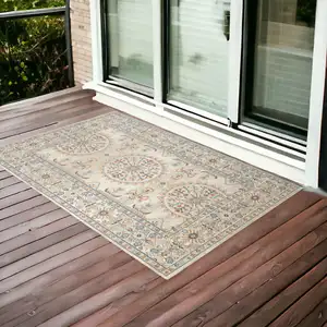 Photo of Blue and Orange Medallion Stain Resistant Indoor Outdoor Area Rug