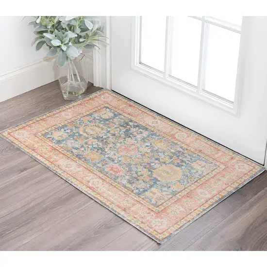 Coral and Blue Oriental Power Loom Worn Faded Area Rug Photo 1