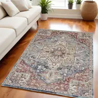 Photo of Blue and Red Floral Distressed Area Rug