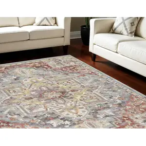 Photo of Blue and Red Floral Distressed Area Rug