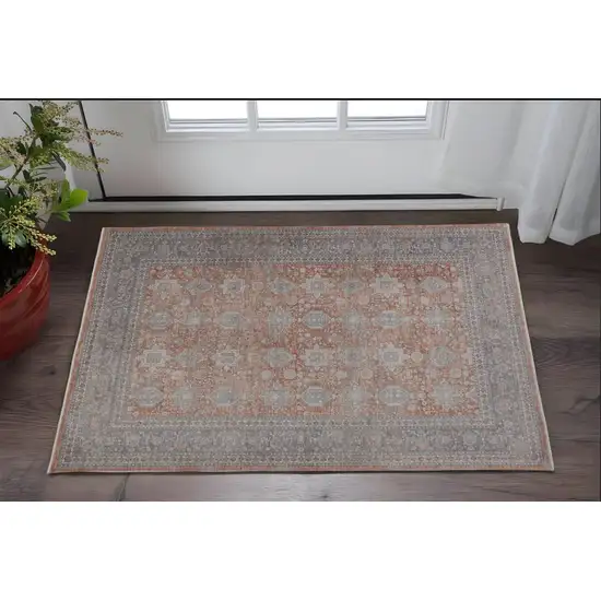 Blue and Red Oriental Power Loom Worn Faded Area Rug With Fringe Photo 1