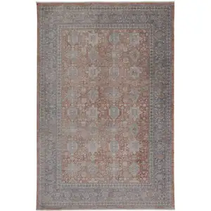 Photo of Blue and Red Oriental Power Loom Worn Faded Area Rug With Fringe